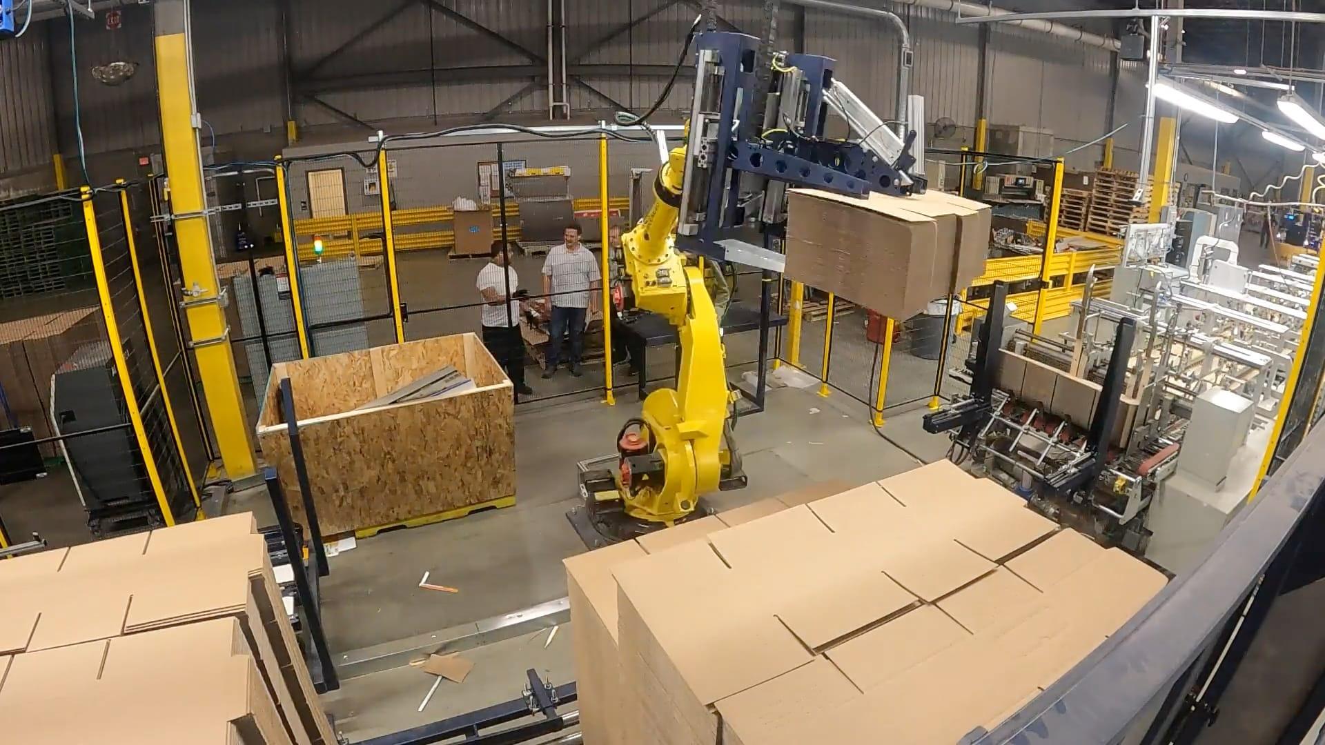 Thumbnail image of time lapse video showing smart pre-feeder picking corrugated material.